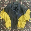 pelle pelle soda club leather jacket, pelle pelle store, pelle pelle jacket, black and yellow leather jacket